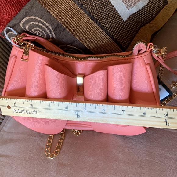 CROSSI NY. NWT. Beautiful Coral, crossbody bag with bow on front. Gold c… - Picture 4 of 8